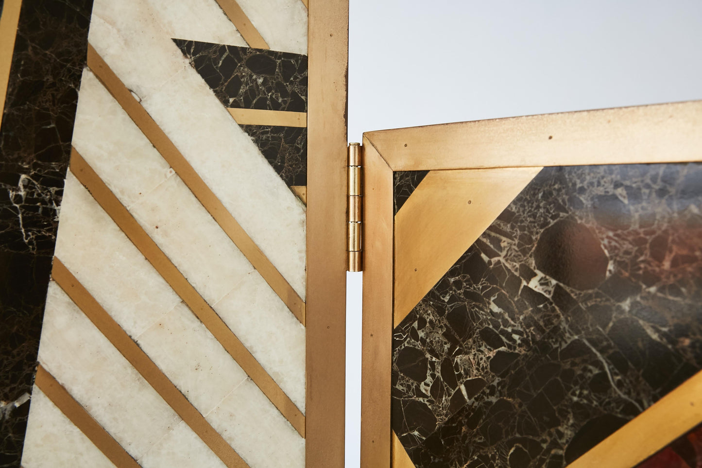 Custom Marble and Brass Geometric Screen from Viceroy Miami